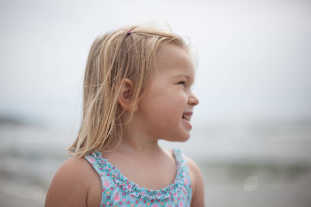 istock girl at the beach 693254374