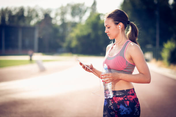 istock Music in my ears while I go jogging 693256596