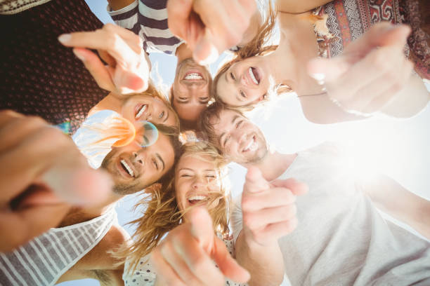 istock Group of friends forming a huddle 693259066