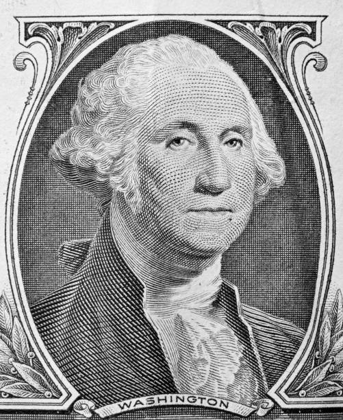 istock George Washington portrait on one dollar bill. 693262728