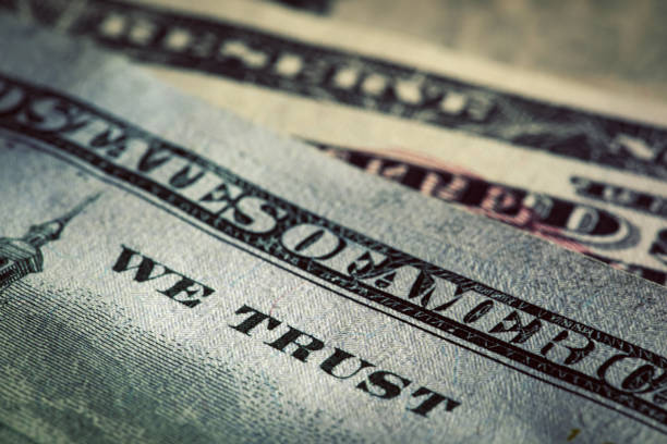 istock In God We Trust motto on One Hundred Dollars bill 693262770