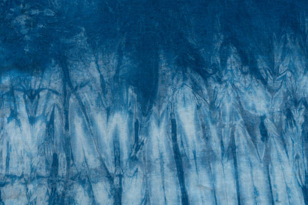 istock Dyed indigo fabric background and textured 693273442