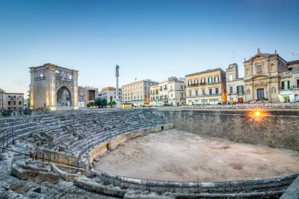 Ancient amphitheater in city center of Lecce, Puglia, Italy