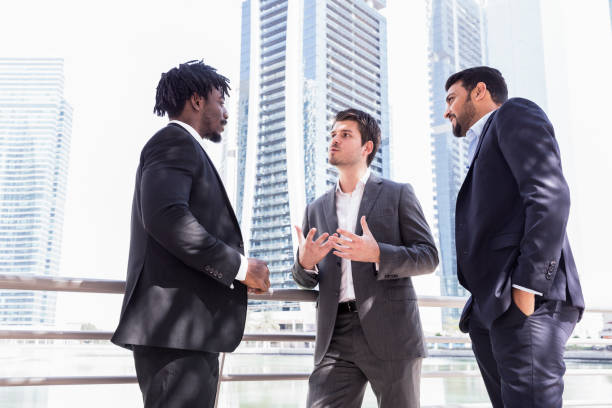 istock Businessmen debating about their business proposal 693278604