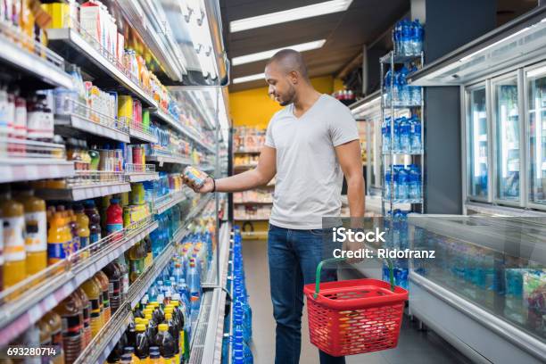 Man At Supermarket Stock Photo - Download Image Now - Supermarket, Shopping, Men