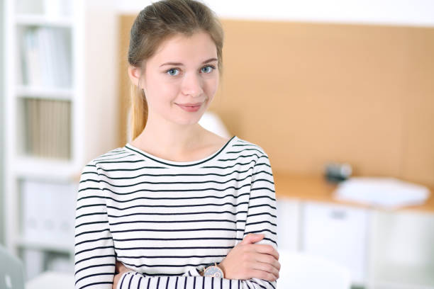 istock Young business woman designer discussing architecture project with client in office. Successful startup business concept. 693285024