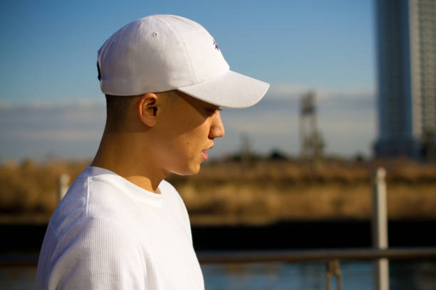 istock Asian young boy looking at the sea 693290082