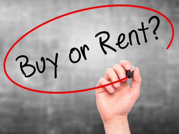 istock Man Hand writing Buy or Rent? with black marker on visual screen 693293430