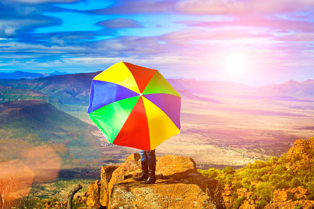 Bright colourful umbrella on scenic hilltop, Camdeboo National Park, Graaf-Reinet, Eastern Cape, South Africa
