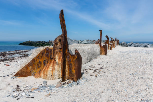 istock Old decayed breakwater at Dune, small island near Helgoland, Germany 693306796