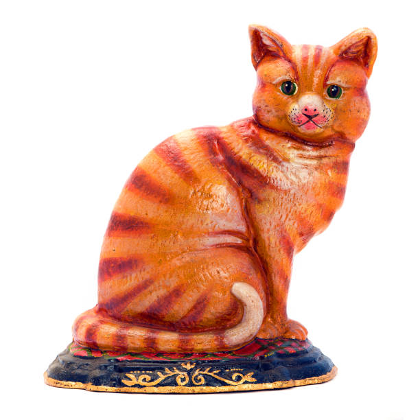 istock Colered antique figurine  of a cat. 693318294