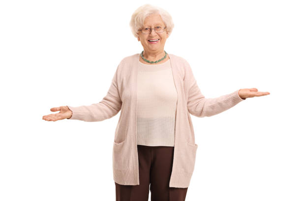 istock Cheerful elderly woman gesturing with her hands 693318764
