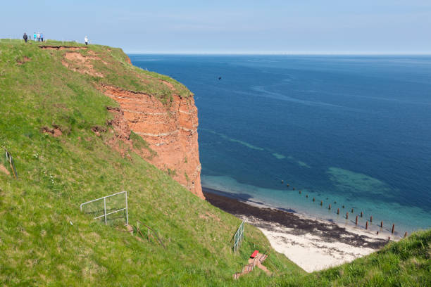 Red cliffs and beach at German island Helgoland