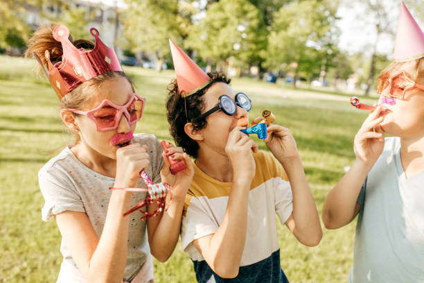 istock Kids having fun on birthday party 693322580