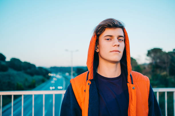 Casual young man by the highway