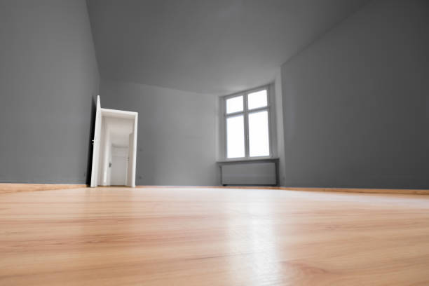 istock empty room, wooden floor in new apartment 693332922