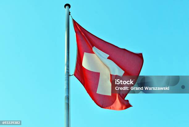 Swiss Flag Blowing In The Wind Stock Photo - Download Image Now - Flag, Bern, Blowing