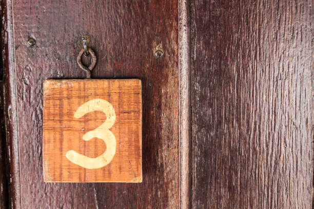 istock 3 address number in wood 693360272