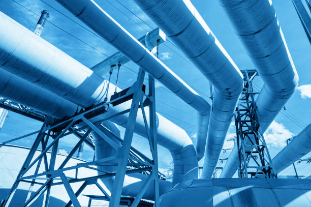 istock Pipes at thermal electic power station. Industry 693363576