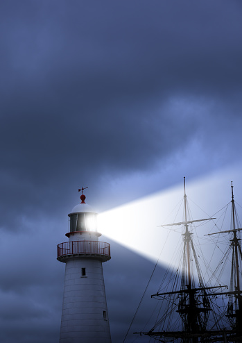 Lighthouse, beam, bad weather and old ship really close