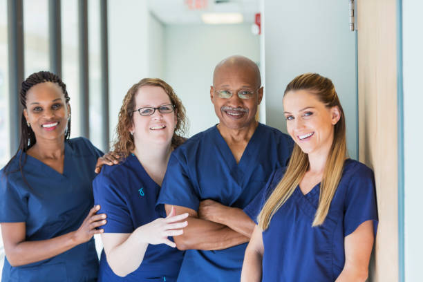 istock Team of four multi-ethnic medical professionals 693369958