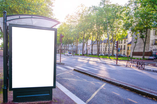 Advertising board with blank white display and copy space in an urban street stock photo