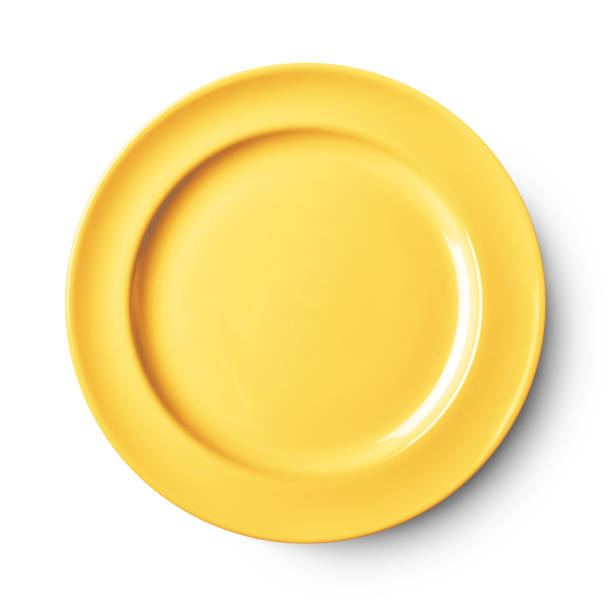 Simple white circular plate Empty ceramic round plate isolated on white with clipping path Isolated On Yellow stock pictures, royalty-free photos & images