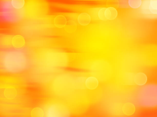 istock fresh fruity bokeh effect background in shades of orange and yellow with motion blur 693376868