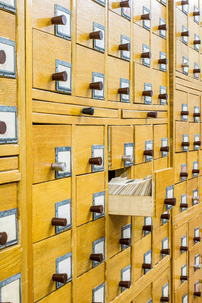 Old wooden card catalogue in library. Front view. Education background concept.