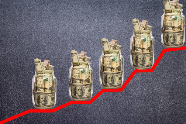 istock Financial growth concept with dollar bills ladder 693377474