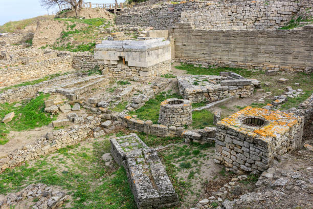 Ruins in the ancient city of Troy, in Turkey, Asia Minor with view of surrounding area Holy Place in the Ruins of the  ancient city of Troy, in Turkey, Asia Minor troia stock pictures, royalty-free photos & images