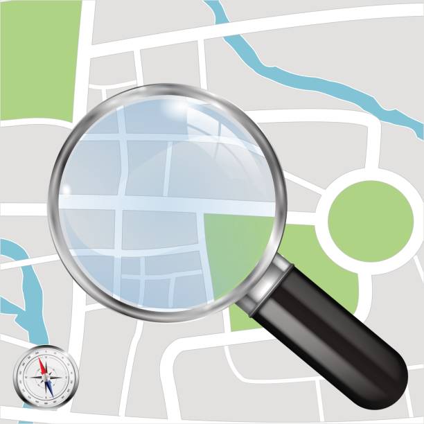 istock Abstract town plan. City map and Transparent Magnifying glass an 693388746