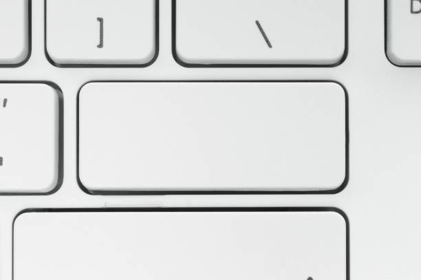 Computer keyboard close-up Blank button of the computer keyboard close-up enter key computer keyboard computer key white stock pictures, royalty-free photos & images