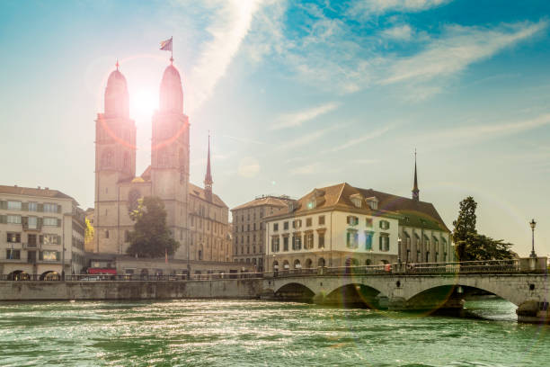 Grossmunster Church and Bridge in Zurich Grossmunster Church and Bridge in Zurich, capital of Switzerland. switzerland zurich architecture church stock pictures, royalty-free photos & images