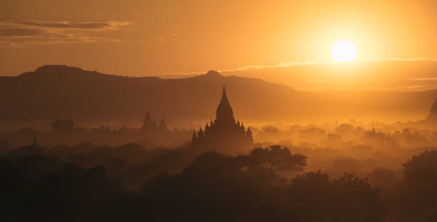 istock Myanmar Bagan historical site on magical sunset with beautiful sky and Buddhist temples panoramic view 693400016
