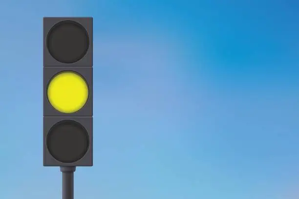 Vector illustration of Traffic lights with yellow light on.