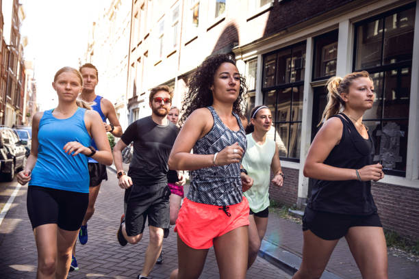 istock Urban runners crew training in the city 693413184