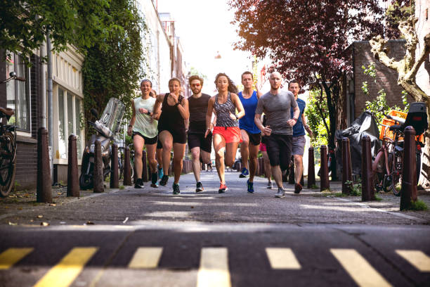 istock Urban runners crew training in the city 693416080