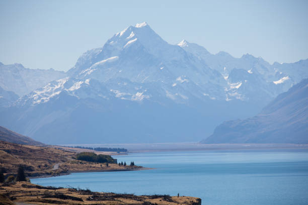 Sunny sky above Mount Cook. Mount Cook, also known as Aoraki,  is New Zealand`s highest mountain (3724m).