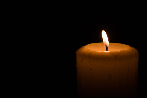 istock A candle in the dark 693432584