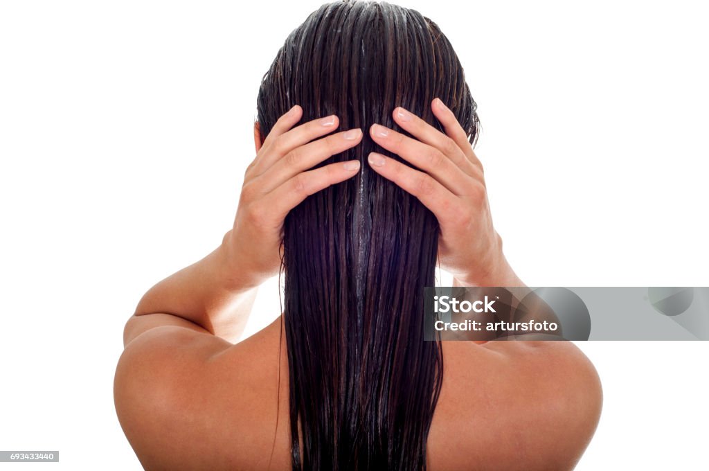 Concepto de cuidado del cabello. Vista posterior de mujer con fondo de largo pelo, blanco - Foto de stock de Pelo libre de derechos