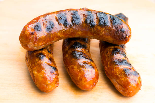 istock Grilled sausage on a wooden board 693442632
