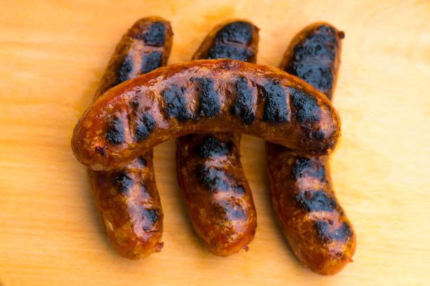 istock Grilled sausage on a wooden board 693442634