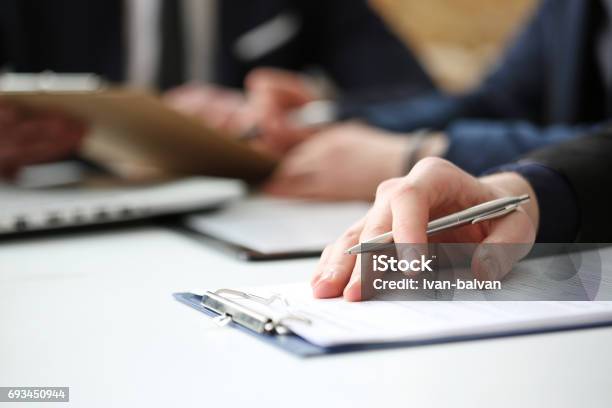 Hand Of Businessman Signing Document With Pen Stock Photo - Download Image Now - Meeting, Close-up, Interview - Event