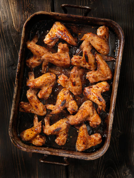 istock Baked Whole Chicken Wings 693454908