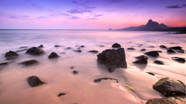istock Sunset at Bai nhat beach, Condao island - Vietnam. 693463706