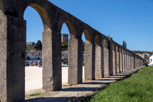 Aqueduct - Obidos in Portugal Ancient aqueduct in the medieval walled town of Obidos in the Oeste region of Portugal. obidos photos stock pictures, royalty-free photos & images