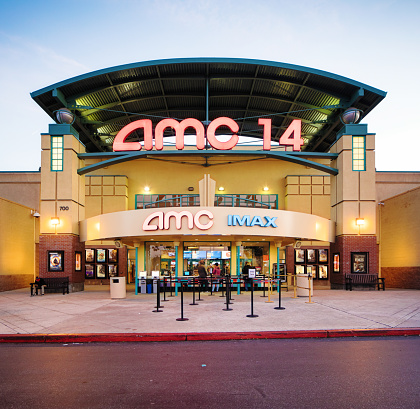 AMC multiplex movie theater entrance facade with sign, photographed in San Jose, California on boxing day.