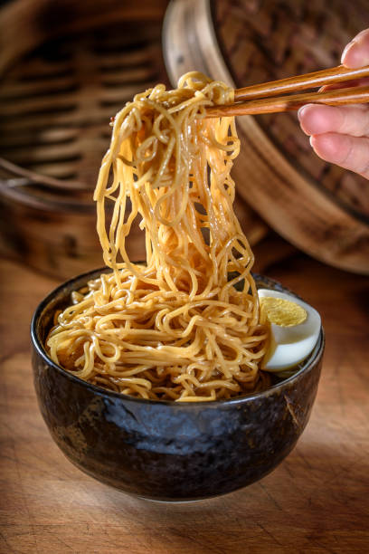 istock Asian Noodle in Soy Sauce 693475240