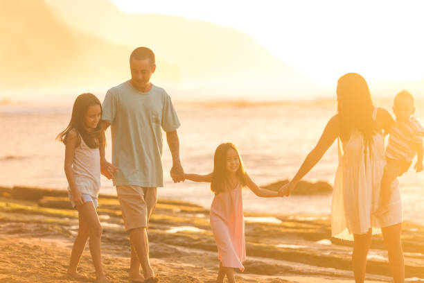 istock Hawaii family vacation on beach 693478148
